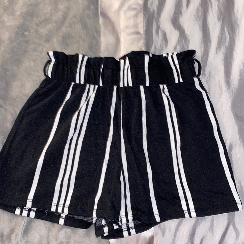 black with white striped shorts